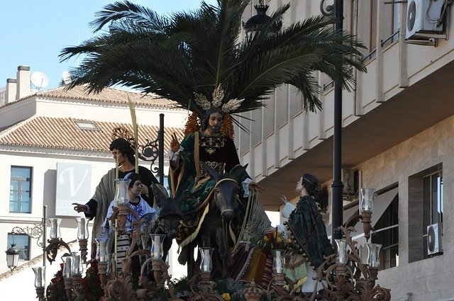 Traditional Semana Santa religious procession with elaborate floats