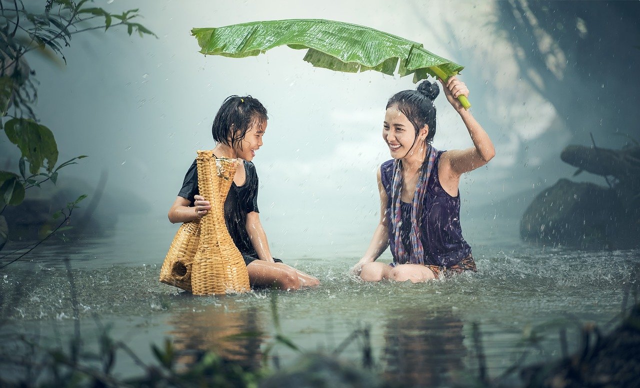 Women Playing in Rain